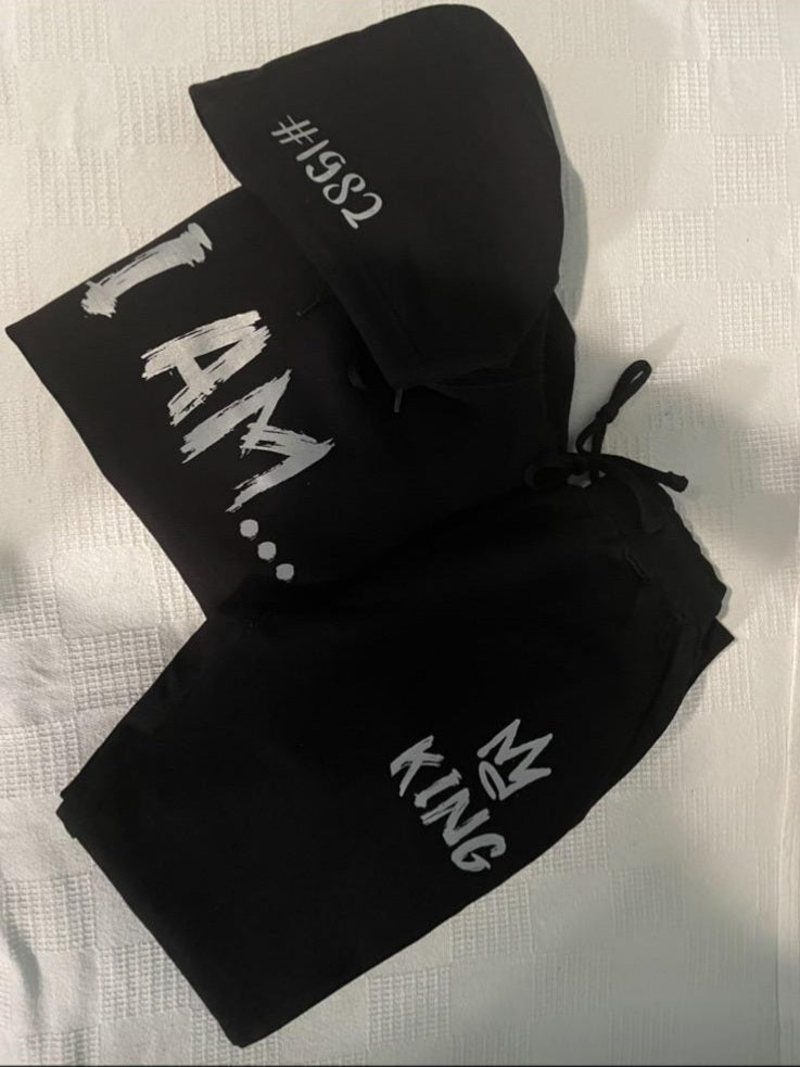 Black sweatsuit/ Silver Reflector Letters
